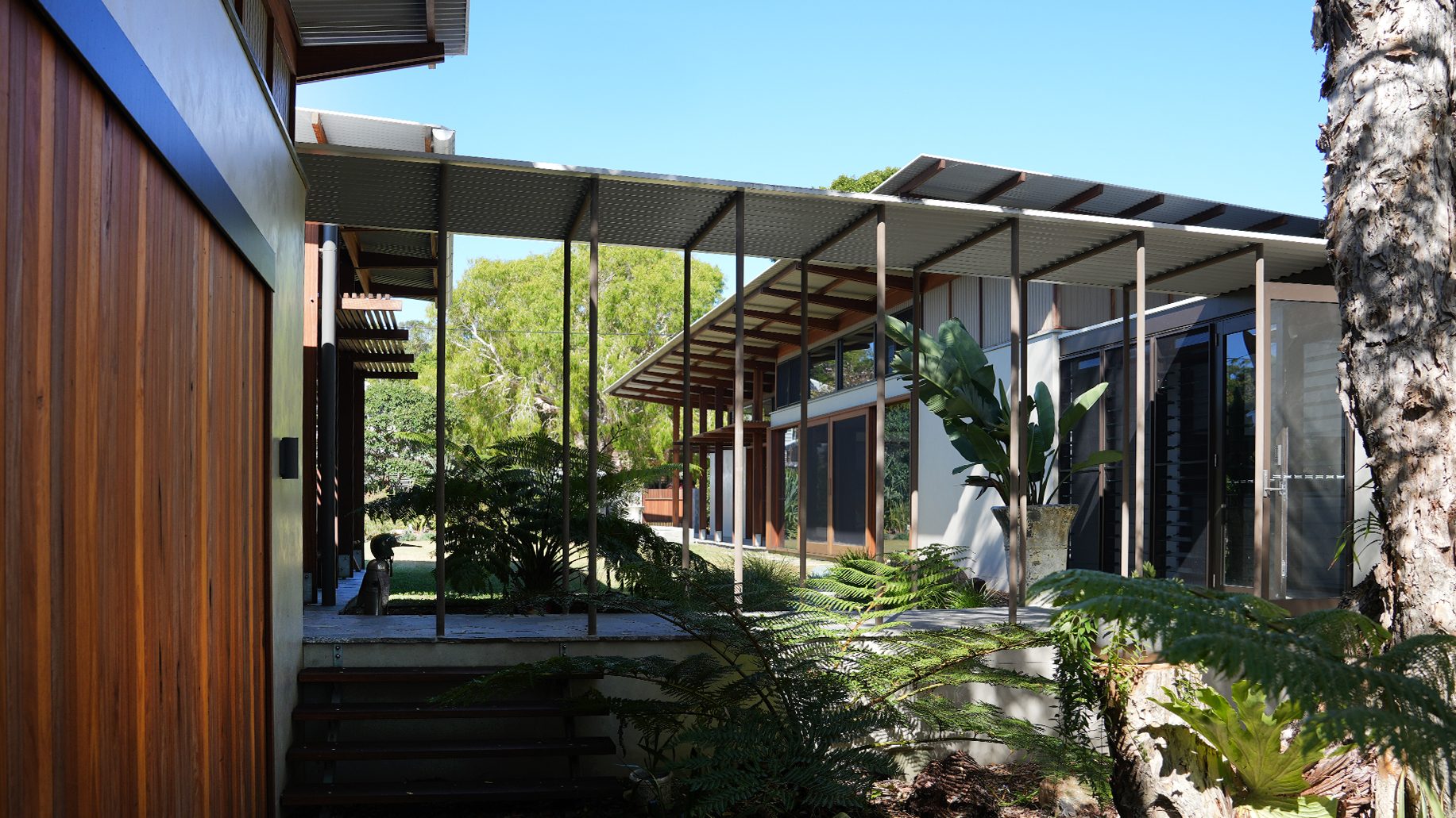 fingal-head-blackbutt-cladding-courtyard.jpg